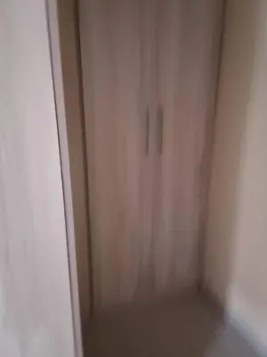 an empty room with a door in the corner at B vhonani in Polokwane
