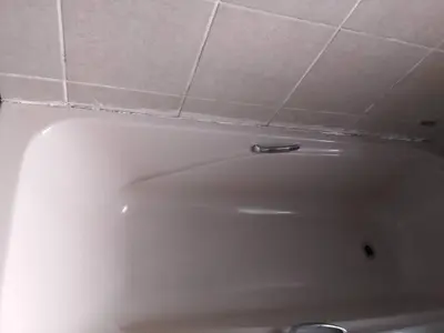 a white bath tub with a tiled ceiling at B vhonani in Polokwane