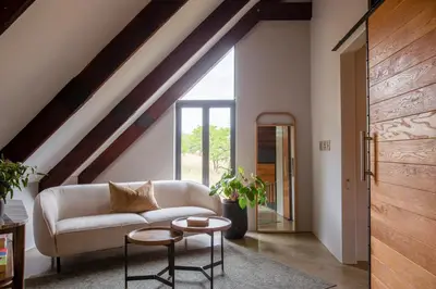 a living room with a couch and a table at House Nyala in Lydenburg