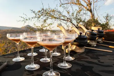 a group of wine glasses sitting on a table at Kambaku II Boat Safaris & Lodge in Phalaborwa