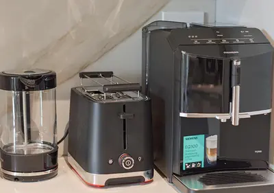 a coffee maker and a blender on a counter at MNM Luxury Suit 424 in Pretoria