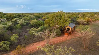 an aerial view of a train on a dirt road at Kwafubesi Tented Safari Camp in Mabula