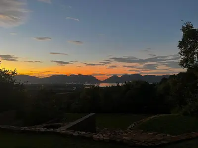 a view of the sunset from the backyard of a house at Anahata Nature Resort in Hartbeespoort