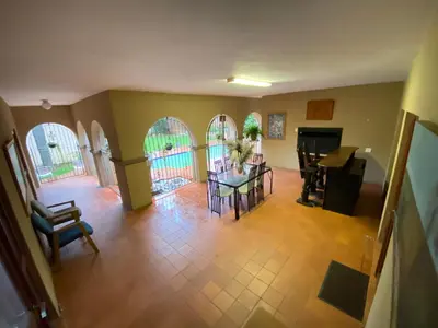 an overhead view of a living room with a table and chairs at Kloofyard Guesthouse in Pretoria