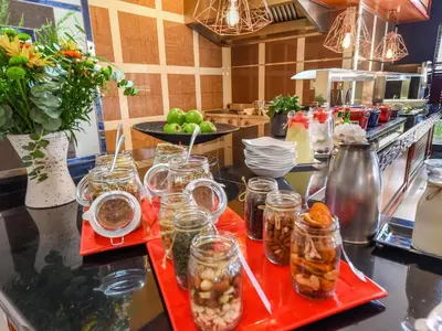 a kitchen with jars of food on a counter at Mercure Johannesburg Midrand in Midrand