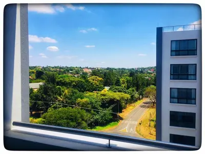 a view from a window of a building at Regency Menlyn Hotel 1Bed Apartment LongStay 32 percent off in Pretoria