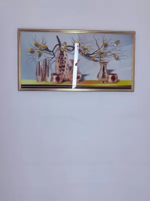 a group of vases on a shelf with a candle at 43 Home Reyno ridge in Witbank
