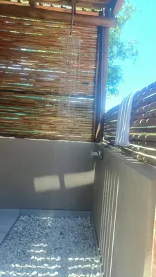 a fence with a window with a blind on it at Fikani game lodge in Thabazimbi