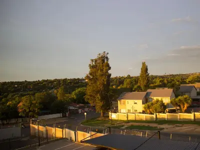 an aerial view of a house with a parking lot at Waterfall Views in Midrand