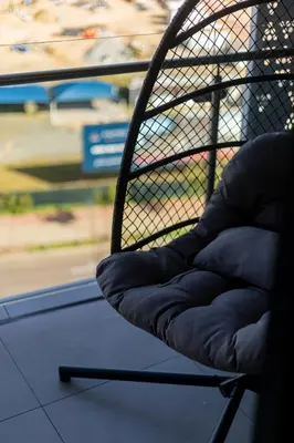 a chair sitting on top of a table at Luxe 4608 Ellipse Waterfall in Midrand