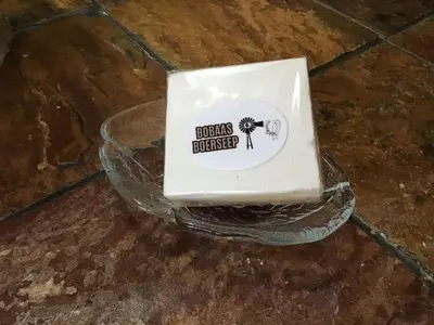 a box of food sitting on top of a glass bowl at Corner View Accommodation in Kaapsehoop