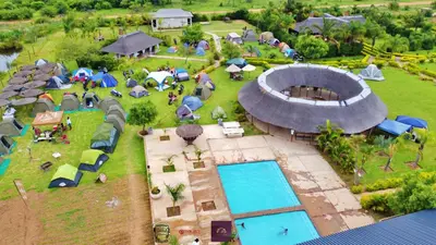 an aerial view of a park with tents and a pool at Florencepalms resort & Spa in Marble Hall