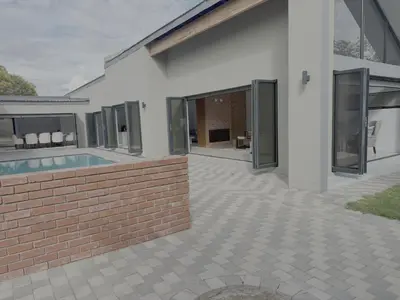 a house with a swimming pool and a brick wall at Kambula Villa 374 Euphoria in Naboomspruit