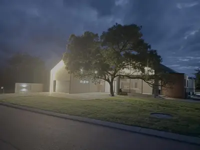 a house with a tree in front of a yard at Kambula Villa 374 Euphoria in Naboomspruit