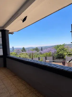 a view from the roof of a house with a butterfly at Lani Accommodation in Pretoria