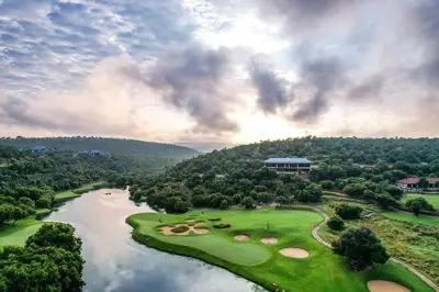 an aerial view of a golf course next to a river at Elements Private Golf Reserve 123 in Warmbaths