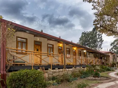 a train car sitting on top of a building at John Jack Inn Accommodation in Lake Chrissie