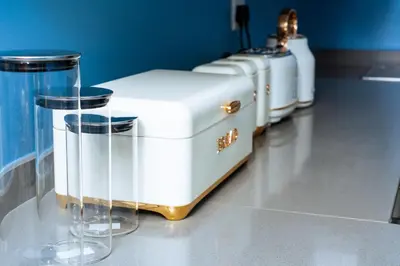 a group of appliances sitting on top of a table at Fully Equipped Modern 2-Bedroom in Midrand