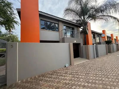 a house with a fence in front of it at Mona Lisa No5 in Polokwane