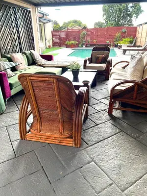 a patio with chairs and couches and a pool at 17 Byvanger Luxury Room 6 in Centurion