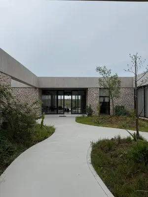a building with a walkway in front of it at Shira Lodge Africa
