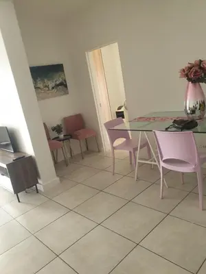a dining room with a table and chairs at The Blyde resort in Pretoria
