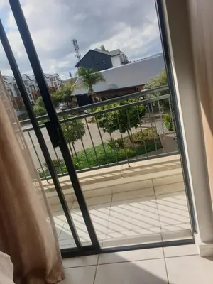 a view from a window of a balcony at The Blyde resort in Pretoria