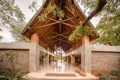 a building with a roof with plants on it at Kapama Southern Camp in Kapama Private Game Reserve