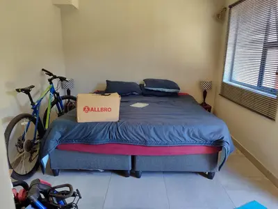 a bedroom with a bed with a box on it at Mvuli haven in Pretoria