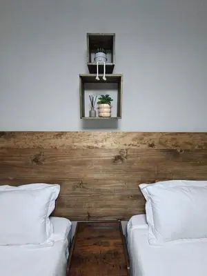 two beds sitting next to each other in a bedroom at Stay-on-Skalie in Nelspruit