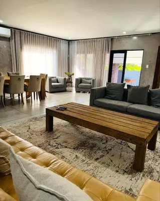 a living room with a couch and a coffee table at Bras boutique in Steelpoort