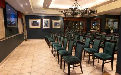 a row of chairs in a waiting room at Villa San Giovanni Accommodation in Pretoria