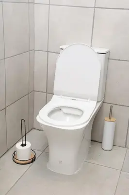a bathroom with a white toilet in a room at Lethabo Guesthouse