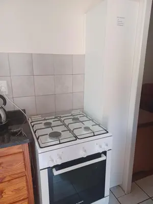 a stove top oven sitting in a kitchen at The Roaches in White River