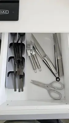 a drawer filled with scissors and other kitchen utensils at Modern Farmhouse, Pool, AC, Wi-Fi in Estate in Hazyview