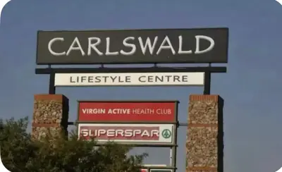 a sign for a carlsbad lifeservice centre at High End 93 On New Stay in Midrand