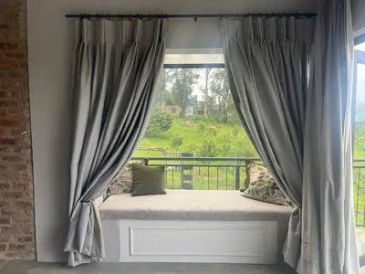 a window seat with a window with a view at Hooggelegen Estate in White River