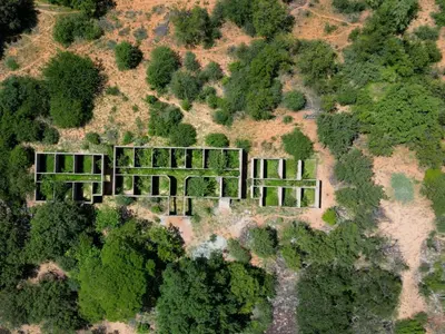 an aerial view of a building with trees at Awelani Eco Tourism Lodge in Masisi