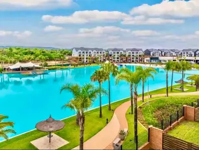 a view of the pool at the resort at Cosy stay at The Blyde With Lagoon in Pretoria