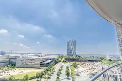a view of the city from a building at Ellipse Manscave Modern Luxury Apartment in Midrand