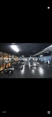 a large building with a gym with cardio machines at Circa apartment unit 42 in Pretoria