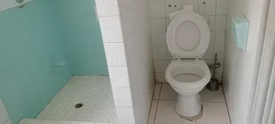 a bathroom with a toilet and a shower at Villa paradiso in Centurion