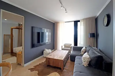 a living room with a couch and a coffee table at 1 Thango Executives Ellipse Gallileo in Midrand