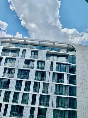 a tall building with a lot of windows at Awesome Apartment in Ellipse Waterfall Cassini in Midrand