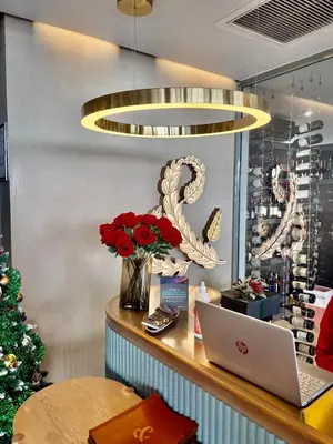 a shop with a christmas tree and a laptop on a counter at Stunning Apartment in Ellipse Waterfall Midrand in Midrand