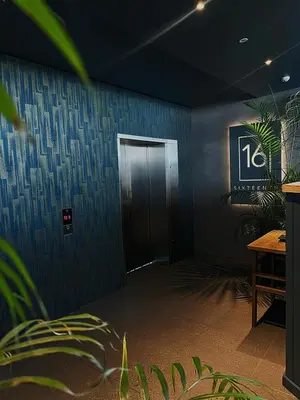 a hallway with a door in a room at TrilogyatMenlyn in Pretoria