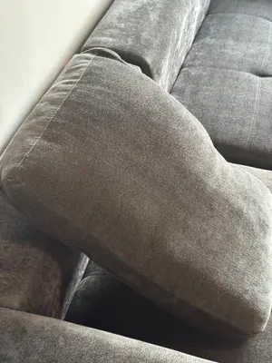a close up of a gray couch at Comfortable stay in Midrand in Midrand