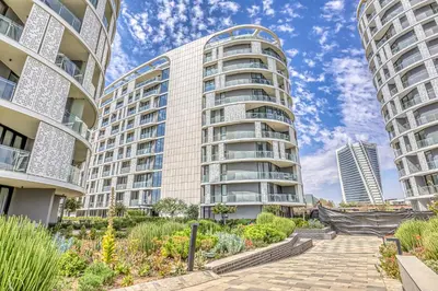 an apartment building with two tall buildings at Belle Vue at Ellipse in Midrand