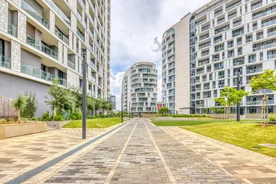 an empty street in a city with tall buildings at Bella Vista at Ellipse in Midrand