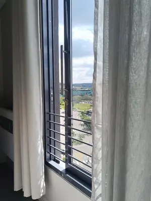 a room with a window with a view at Studio in Menlyn Maine in Pretoria